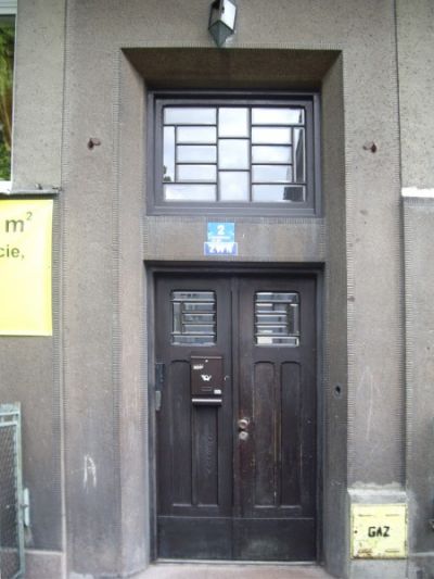 Ozdobny portal kamienicy przy ul. Alsa 2, J. Czadek, 1937.